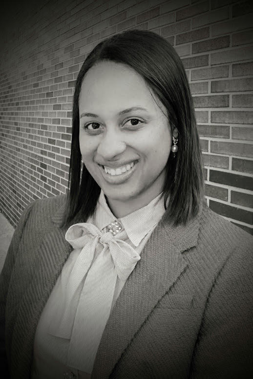 Photo of Black Woman in Suit